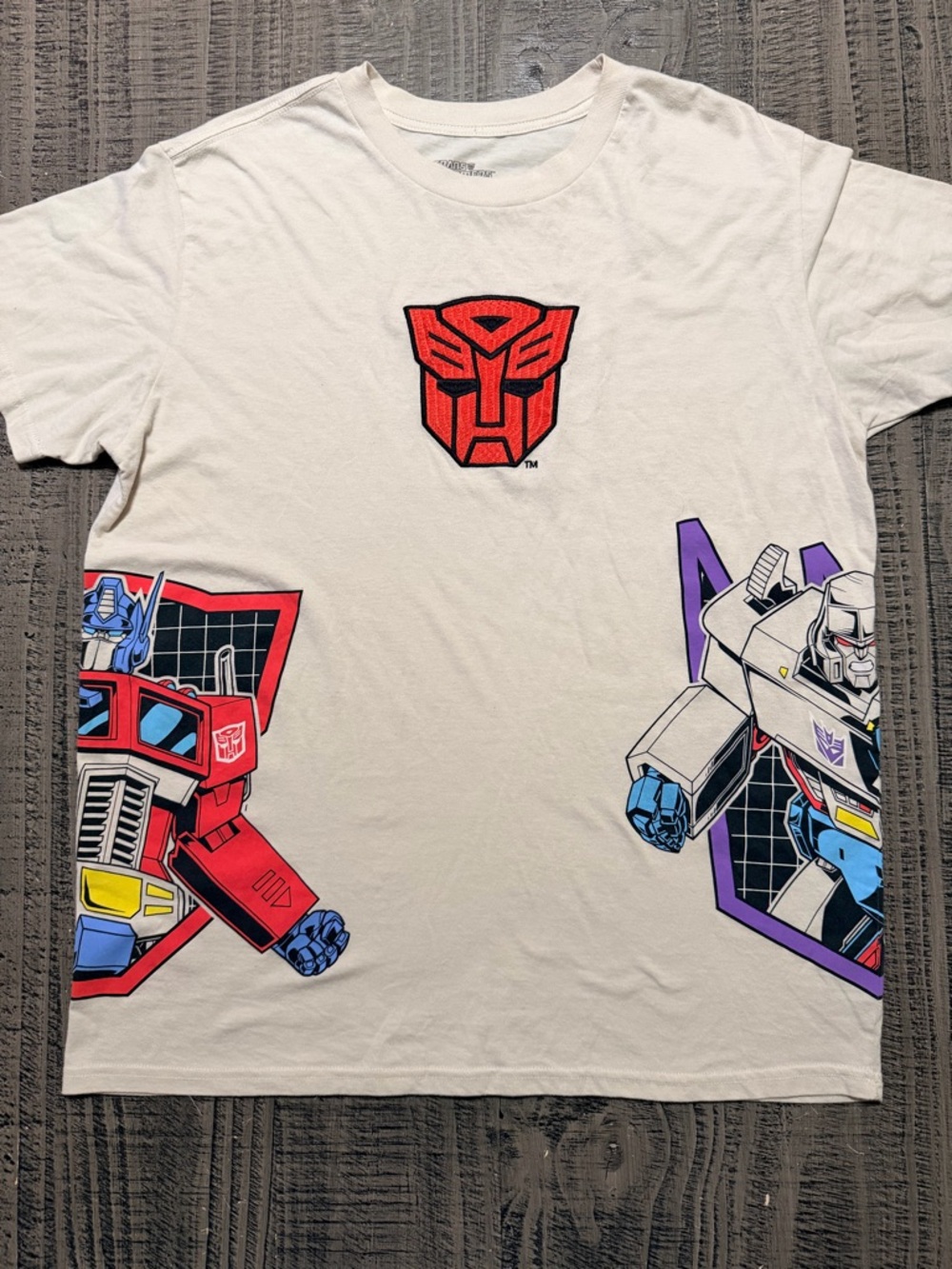 Hasbro Cream Tan Embroidered Transformers Logo T-Shirt